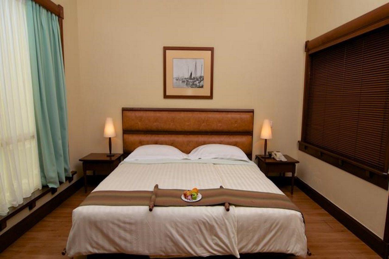 槟城诺瑟姆套房酒店 乔治敦 外观 照片 A bedroom at the hotel