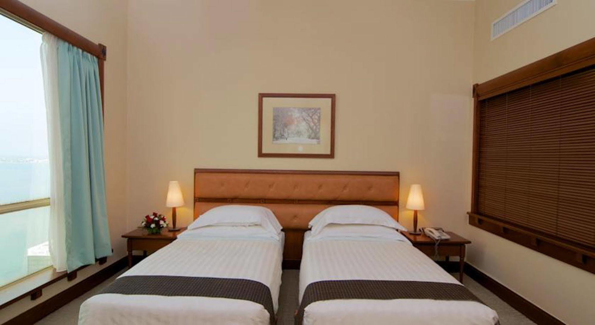 槟城诺瑟姆套房酒店 乔治敦 外观 照片 A room at the hotel